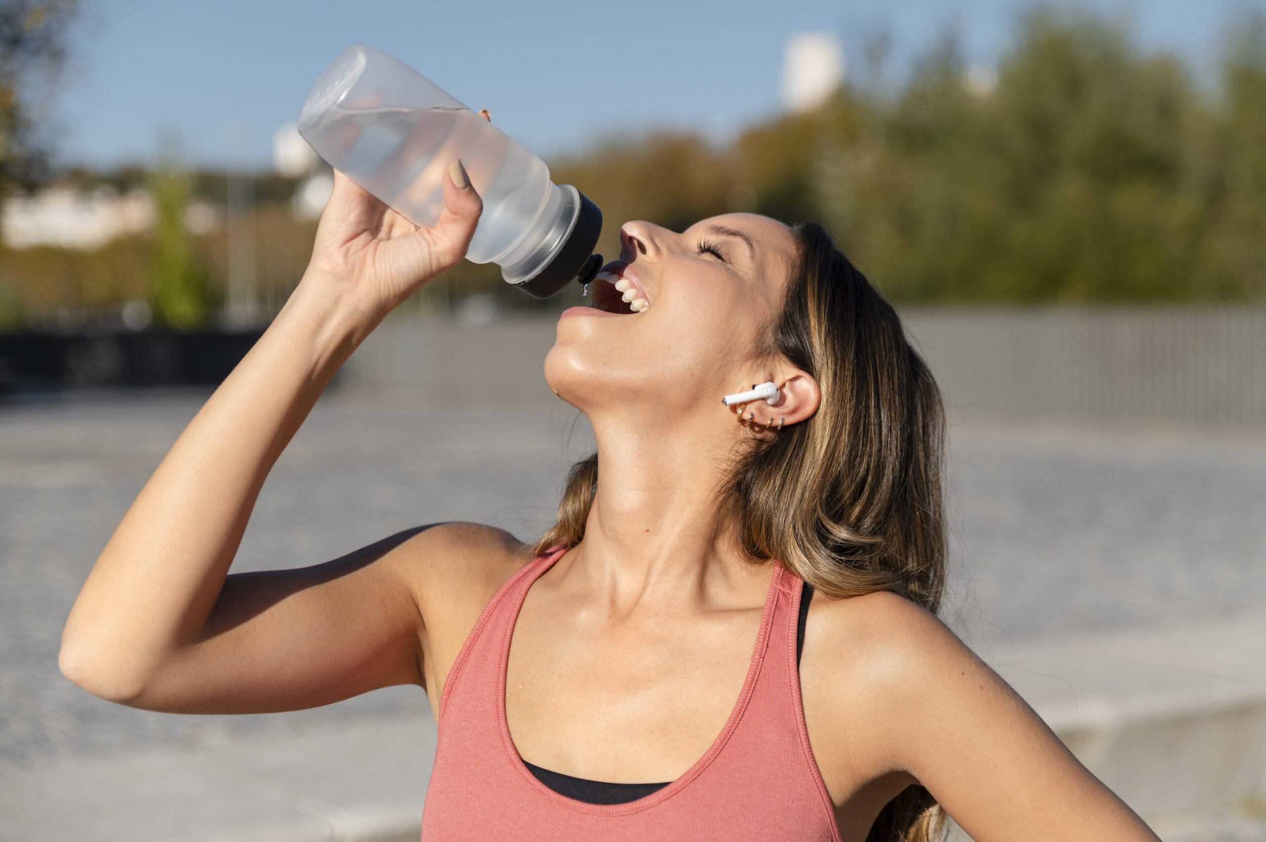 medium-shot-woman-drinking-water